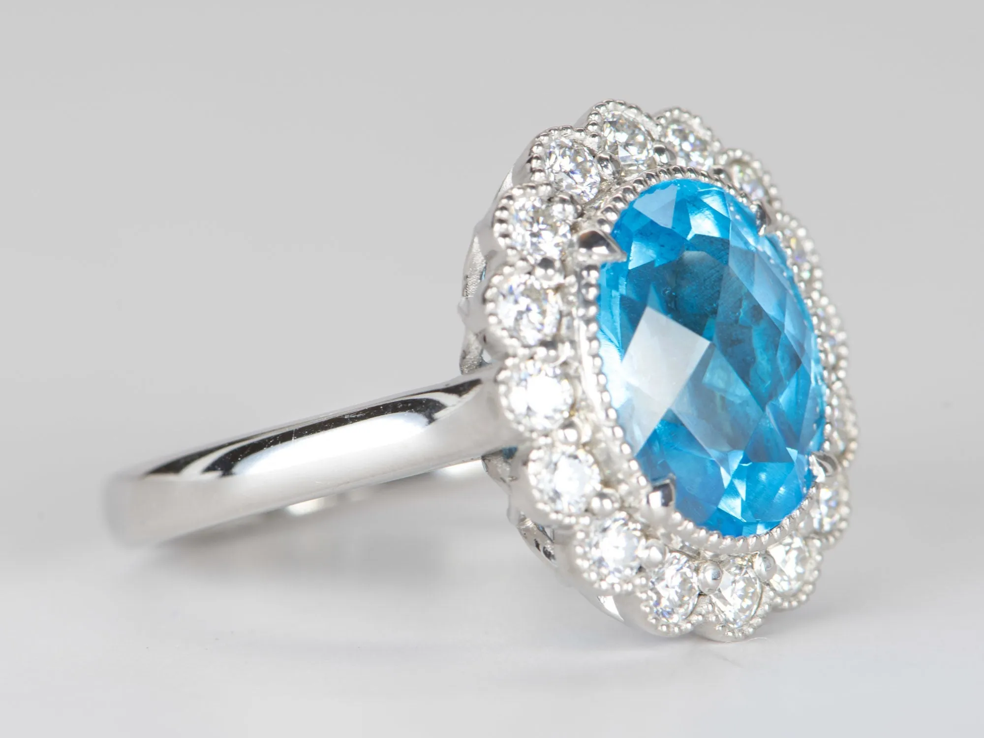 5.27ct Swiss Blue Topaz with Moissanite Halo 9K White Gold Statement Ring R6305