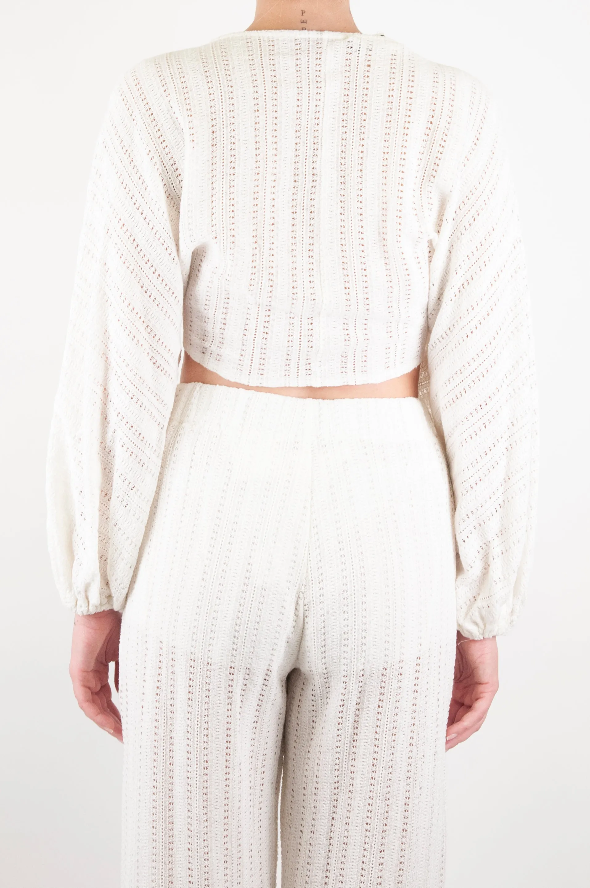 Haveone - Top crochet con nodo e manica lunga