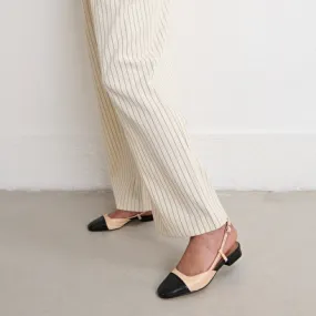 Open back ballet flats in black and beige