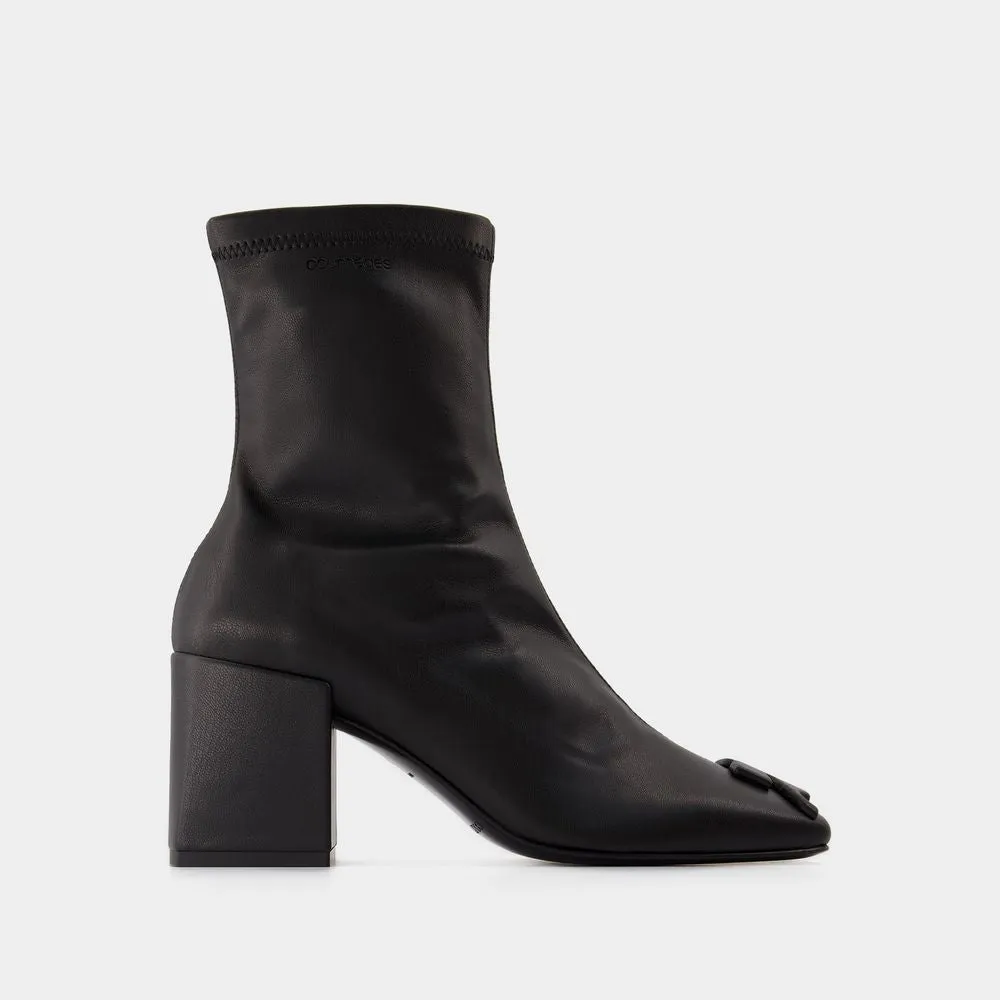 REEDITION ANKLE BOOTS