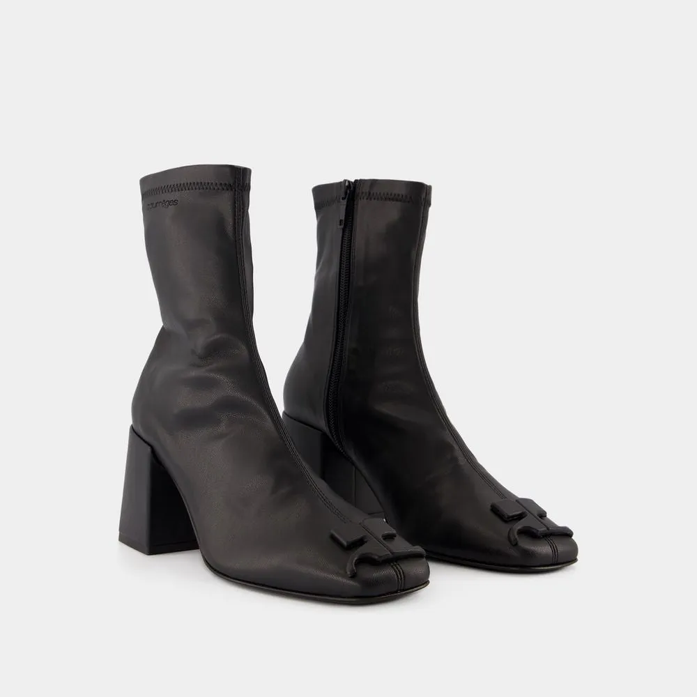 REEDITION ANKLE BOOTS