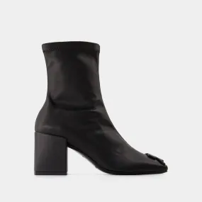 REEDITION ANKLE BOOTS