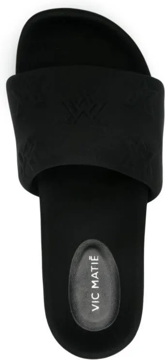 Vic Matie logo-embossed mules Black